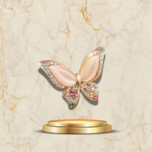 Bijou broche papillon élégant orné de pierres scintillantes pastel