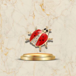 Broche coccinelle rouge avec cristaux brillants