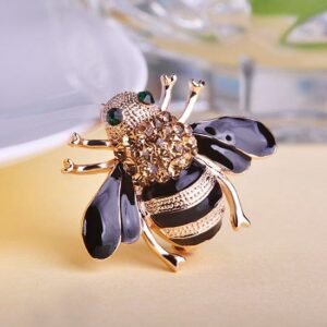broche abeille élégante yeux émeraudes