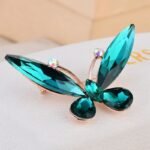accessoire mode broche émeraude