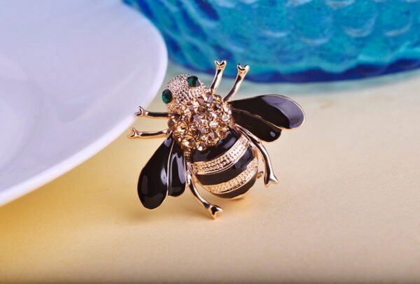 accessoire abeille yeux émeraudes