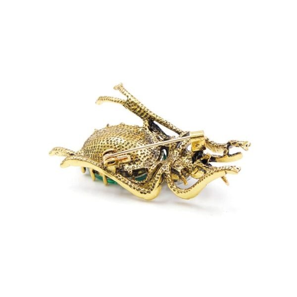 broche design scarabée en cristal vert