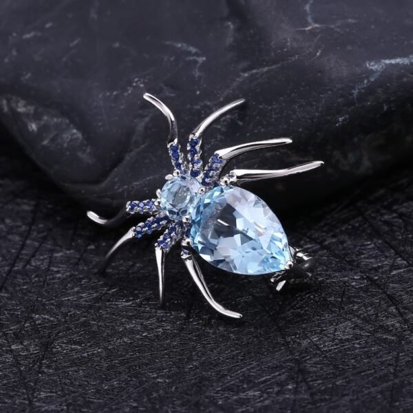 broche en forme d'araignée topaze