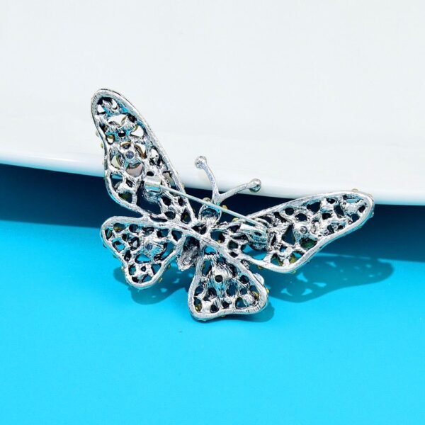 broche en strass forme papillon