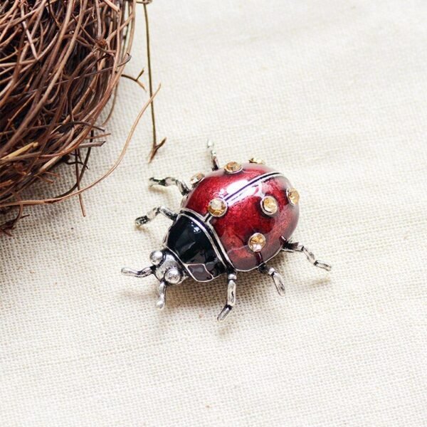 broche insecte coccinelle rouge cuivrée