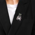 broche ornée de perles scarabée volant