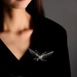 broche papillon design élégant