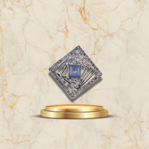 Broche élégante tourbillon en métal argenté et strass