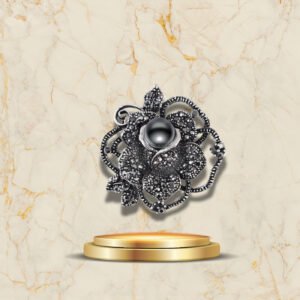 Broche élégante en forme de fleur vintage avec perle centrale noire