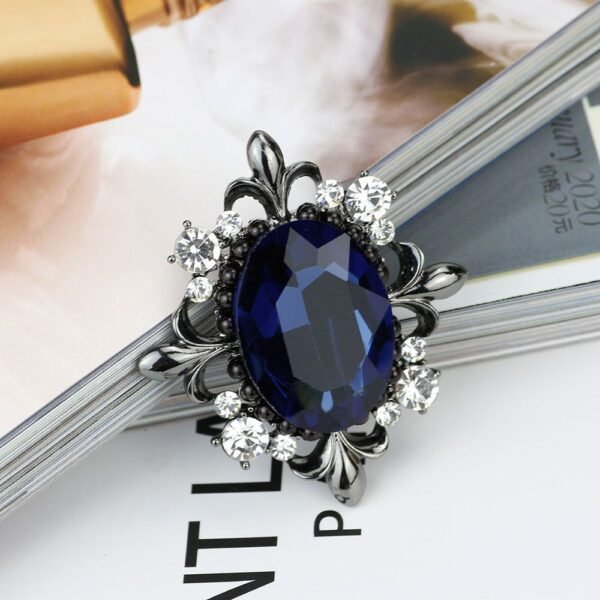 broche en métal bleu nuit