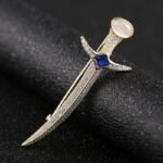 bijou glaive en métal doré