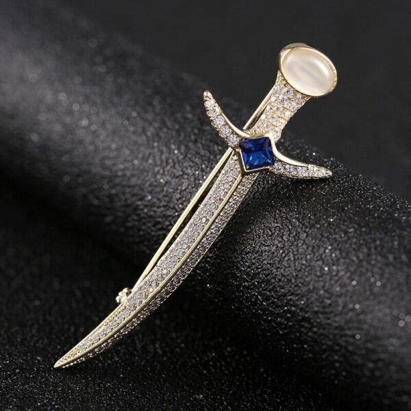 bijou glaive en métal doré