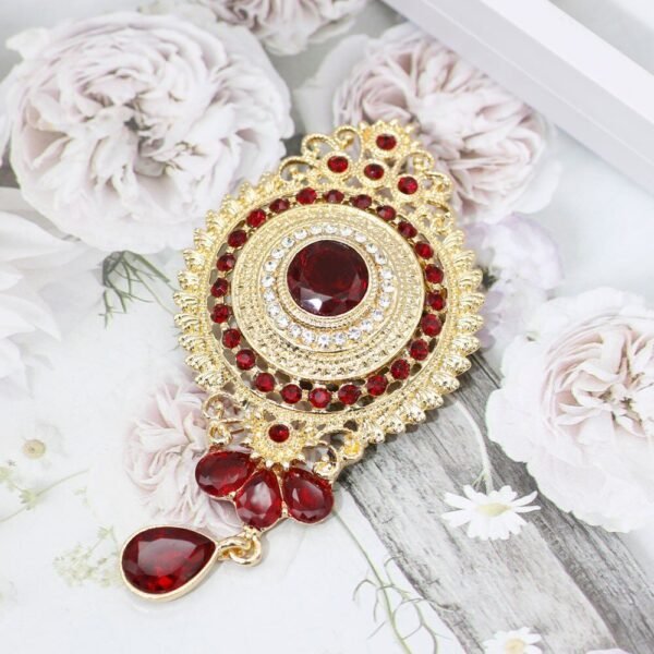 broche décorative soleil mystérieux