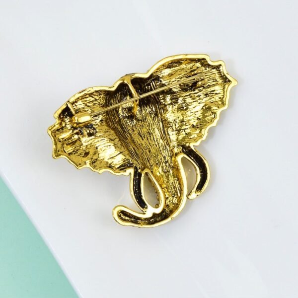 broche en forme d'éléphant étincelant