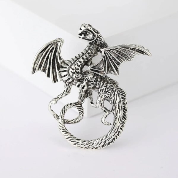 broche en métal dragon