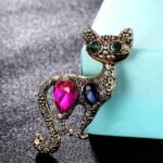 broche en perles chat doré