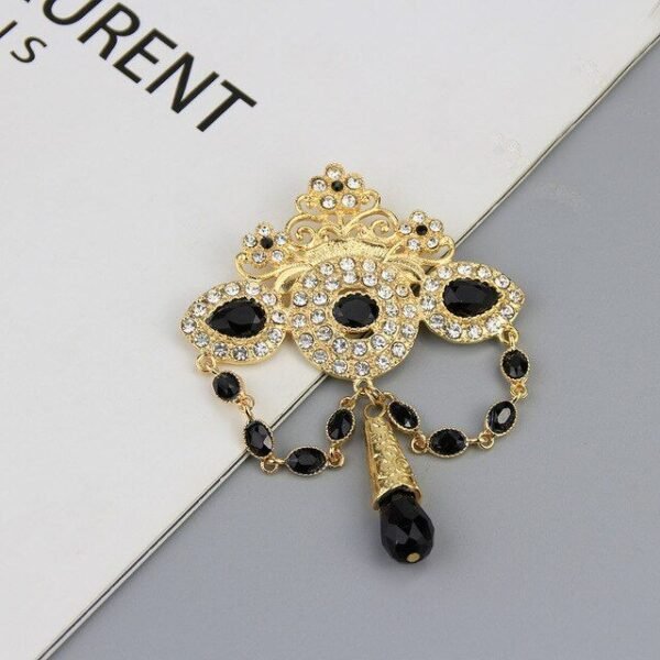 broche vintage en métal doré