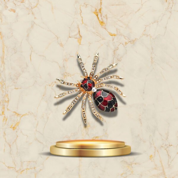Accessoire de mode broche araignée en métal doré et émail rouge