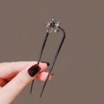 accessoire cheveux broche noire