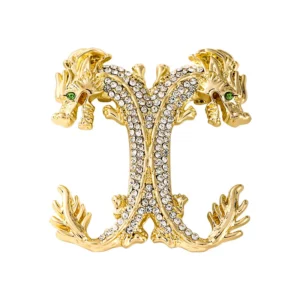 ancien broche tête de dragon