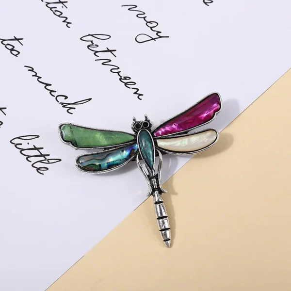broche libellule colorée