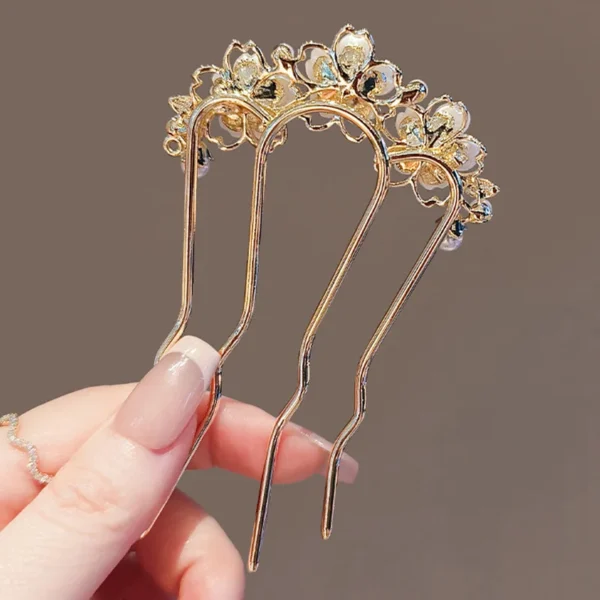broche dorée pour coiffure
