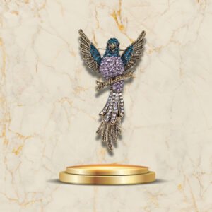 Broche en forme d’oiseau stylisé Art Deco aux ailes déployées