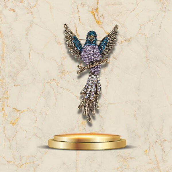 Broche en forme d’oiseau stylisé Art Deco aux ailes déployées