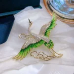accessoire broche oiseau strass