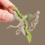 broche décorative oiseau strass