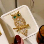 broche en forme de hibou