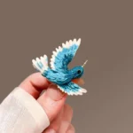 bijou broche en forme d'oiseau