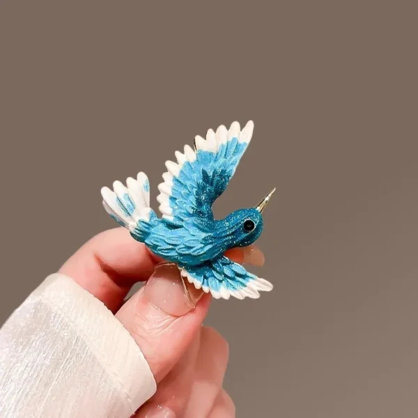 bijou broche en forme d'oiseau