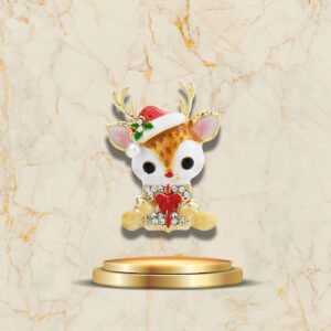 Broche de Noël en forme de biche tenant un cadeau rouge