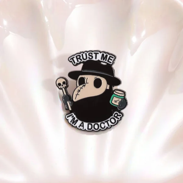 broche métal docteur