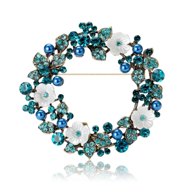 élégante broche couronne festive