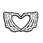 broche haloween coeur squelettique