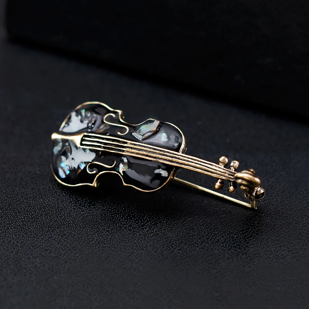 Accessoire broche guitare pour style unisexe