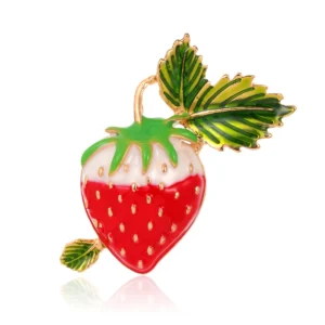 Broche en forme de fraise avec petite feuille