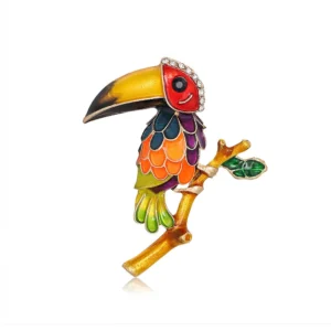 Broche en métal en forme de perroquet coloré