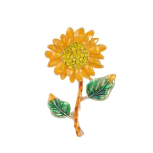 Broche en forme de gerbera sur fond clair
