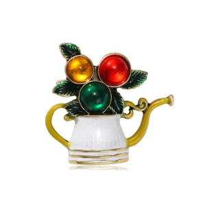 Broche en forme de théière décorative pour Noël