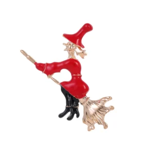 broche sorcière en forme de balai magique