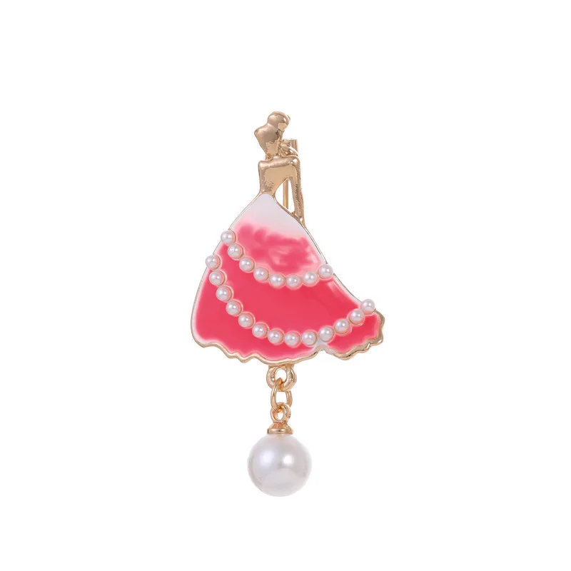 Accessoire de mode stylisé avec motif danseuse