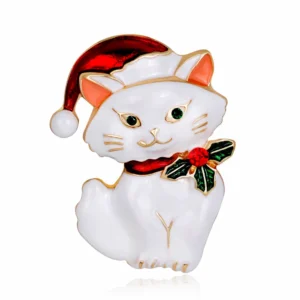 Broche représentant un chat avec un chapeau de Noël