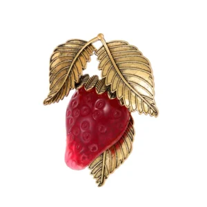 Broche stylisée représentant une fraise