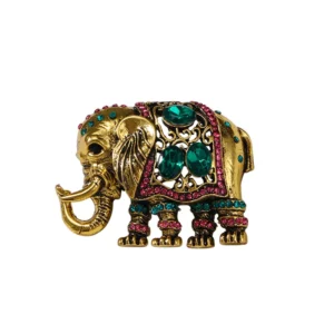 Broche Éléphant Altesse Royale sur fond neutre