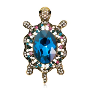 Broche en forme de tortue ornée de strass bleus