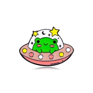 Pin's en forme de grenouille dans une vaisseau spatial