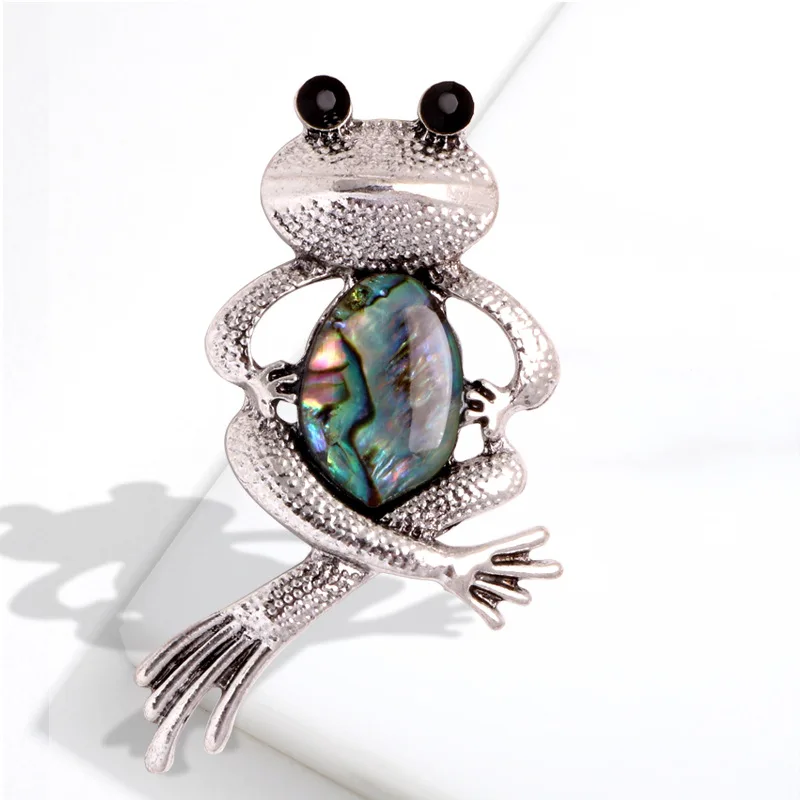 Broche grenouille pour un look unique